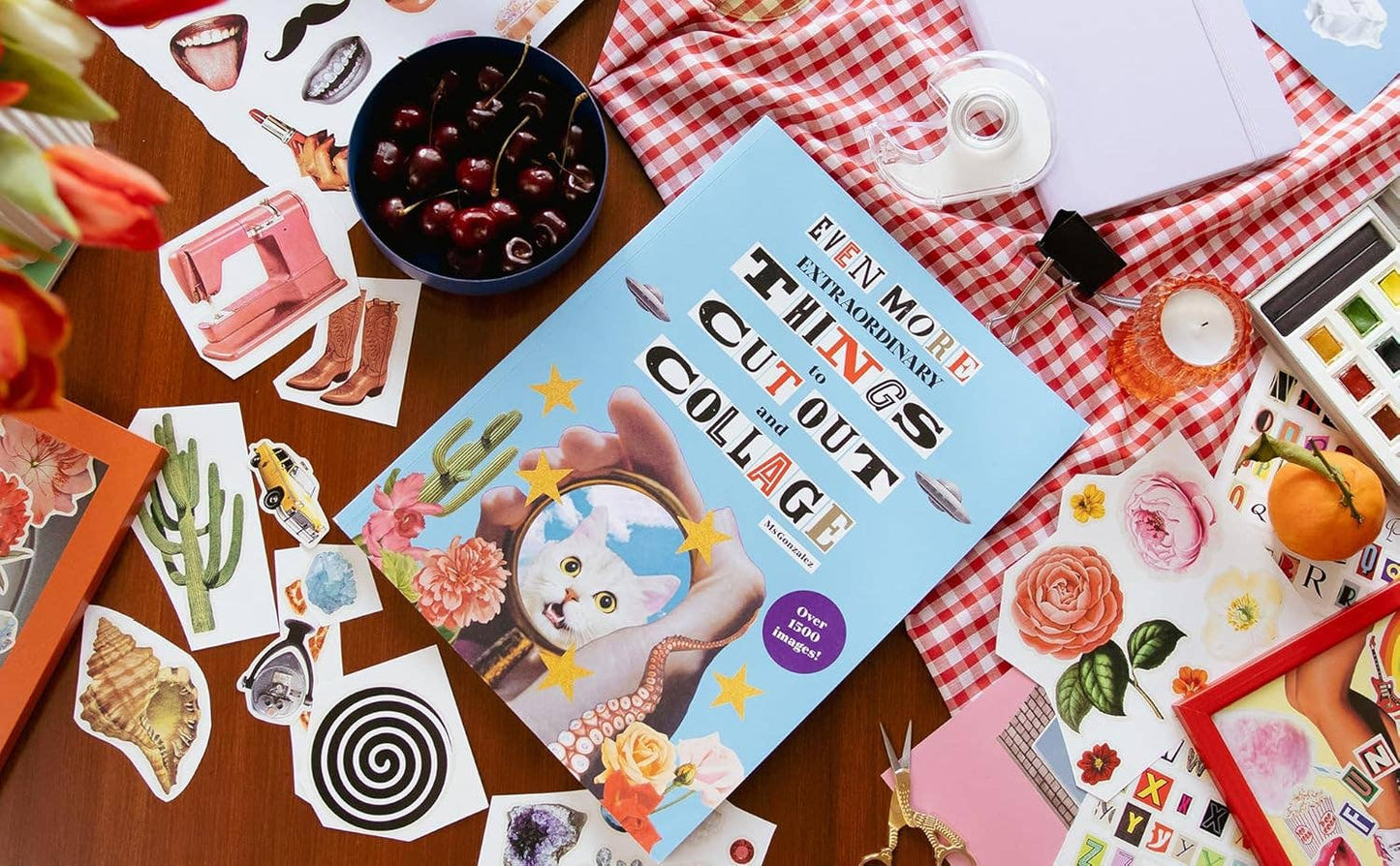 Book titled 'Even More Things to Cut Out and Collage' surrounded by cut-out paper art on a checkered tablecloth.