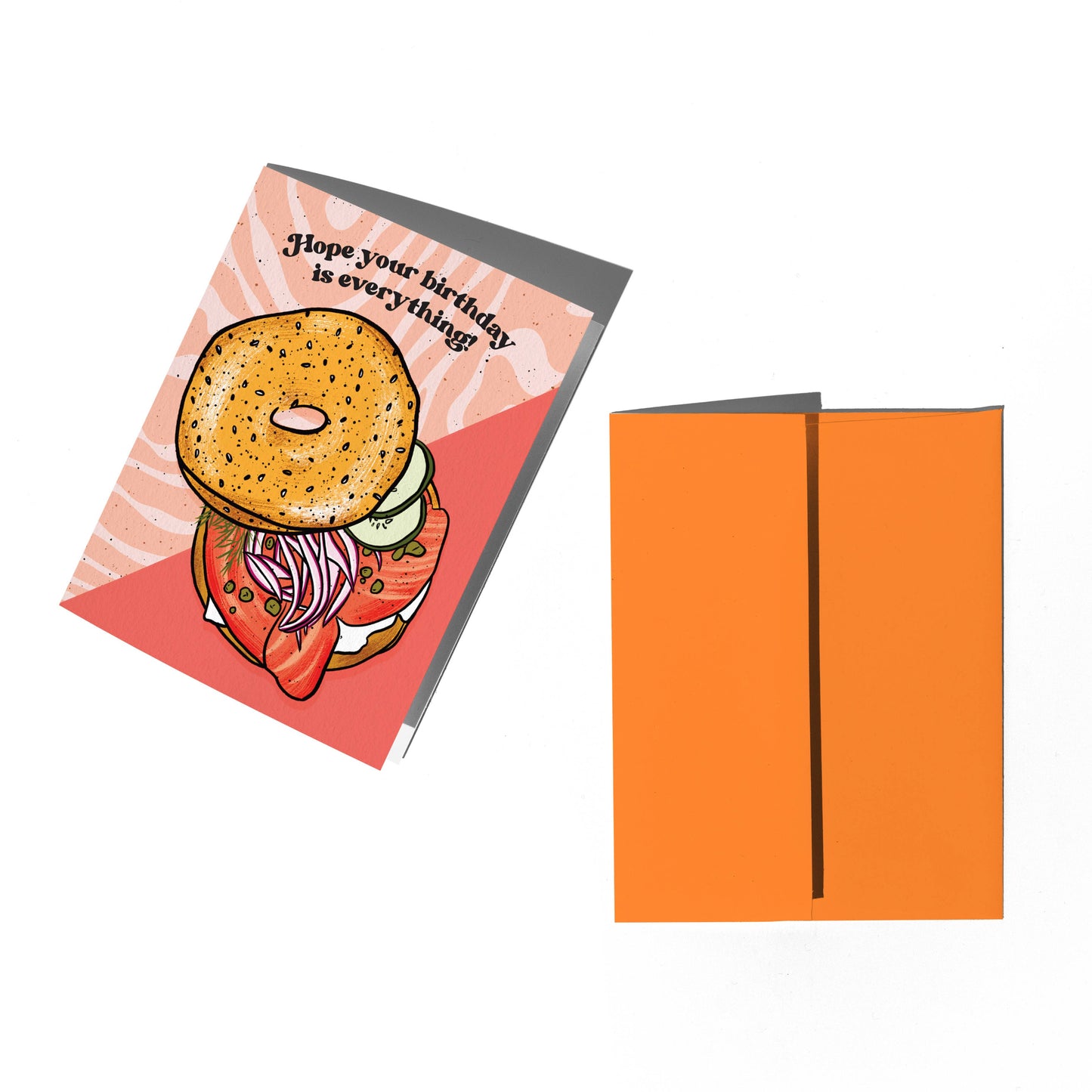 Greeting card with bagel illustration and orange envelope on white background