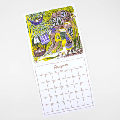 A single-page desk calendar page shown on a light gray background. The top portion features a colorful whimsical illustration of a treehouse scene with a person, animals, plants, and laundry lines.