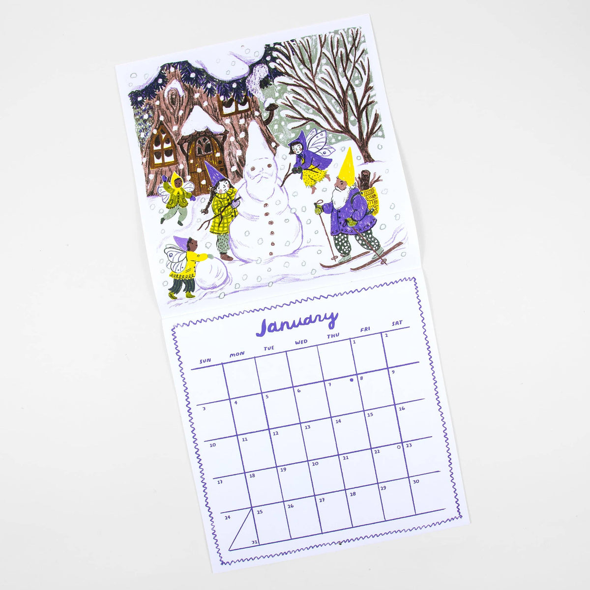 A two-sided desk calendar page shown on a light gray background. The top page features a whimsical winter illustration with a snowman, children in colorful hats and jackets, a house, and bare trees.