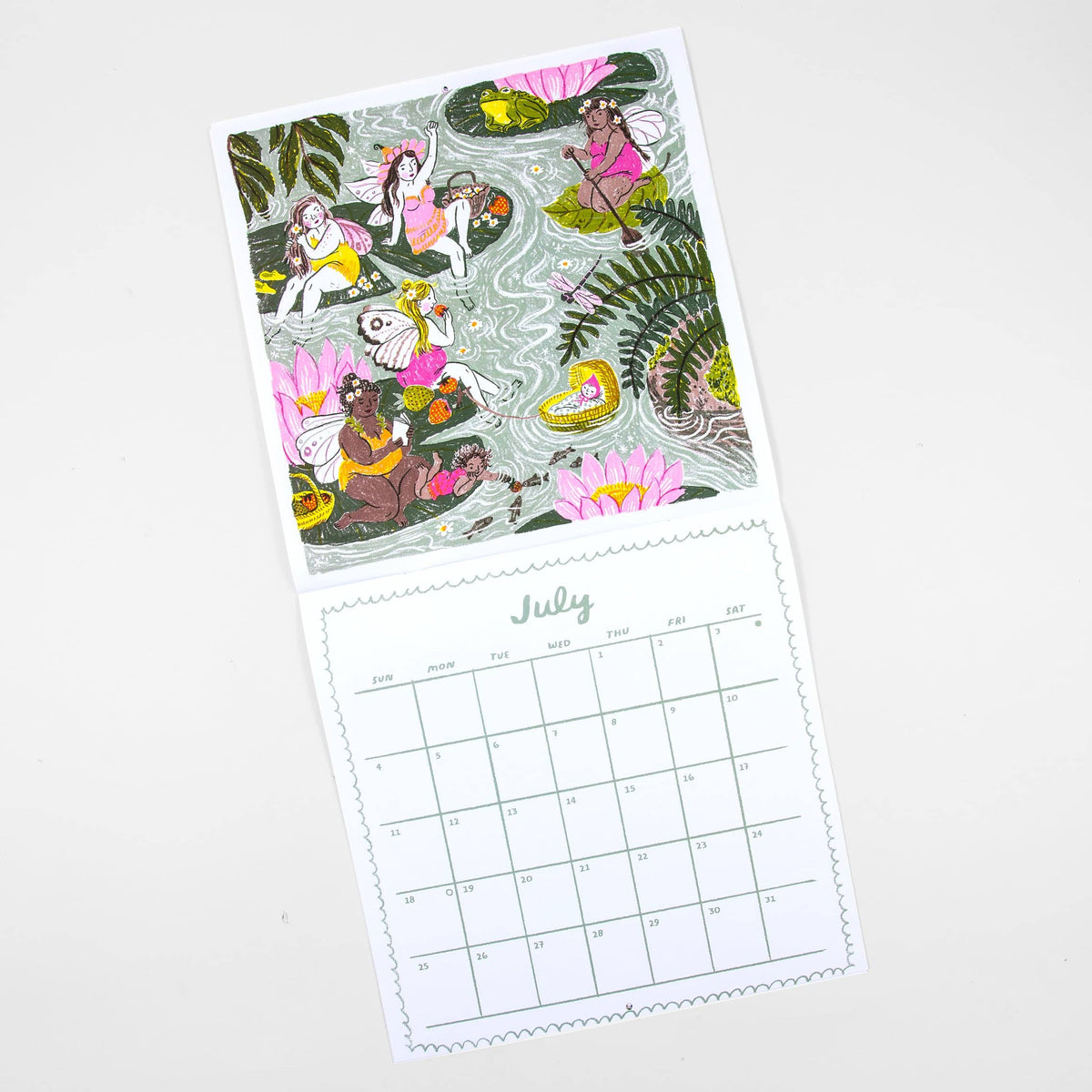 A single-page desk calendar or print with a whimsical illustrated pond scene on the top half and a July calendar grid on the bottom half, photographed on a clean white background.