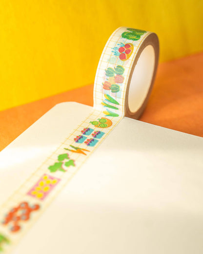 Decorative tape with colorful designs on a yellow and orange background, Farmers Market Washi Tape