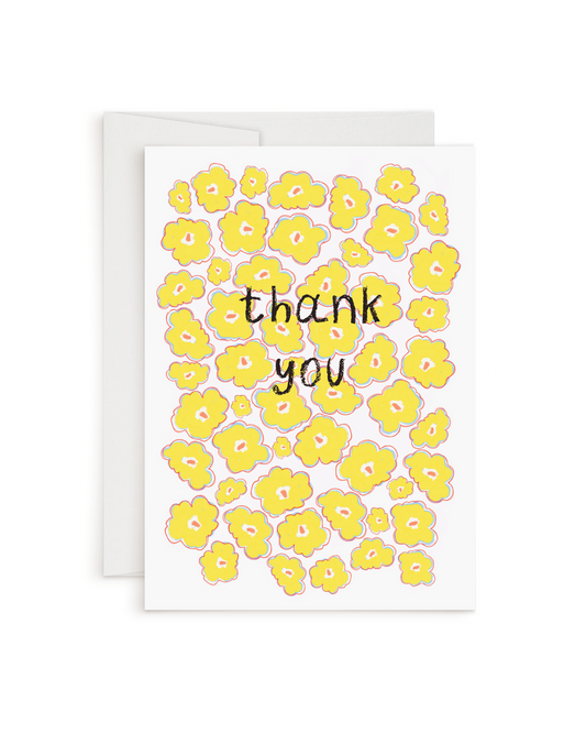 Greeting card with yellow floral pattern and 'thank you' text on a white background
