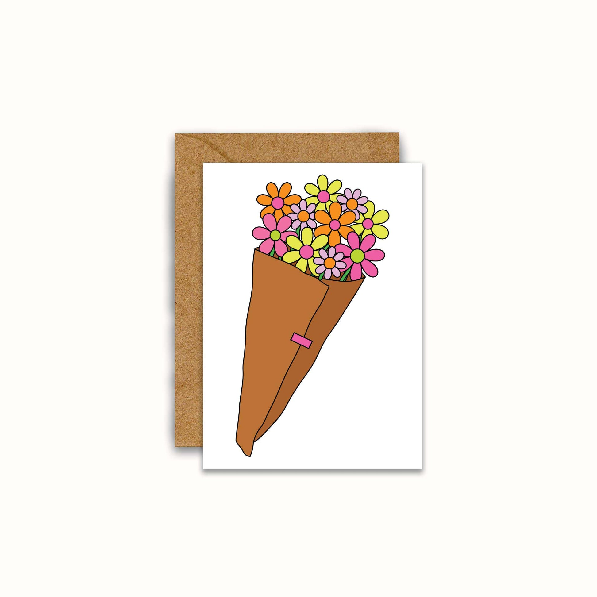 A white greeting card featuring a colorful illustration of a flower cone bouquet, shown with a brown kraft envelope on a light cream background.