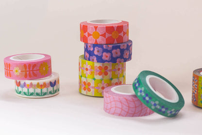 Colorful washi tape rolls on a white background