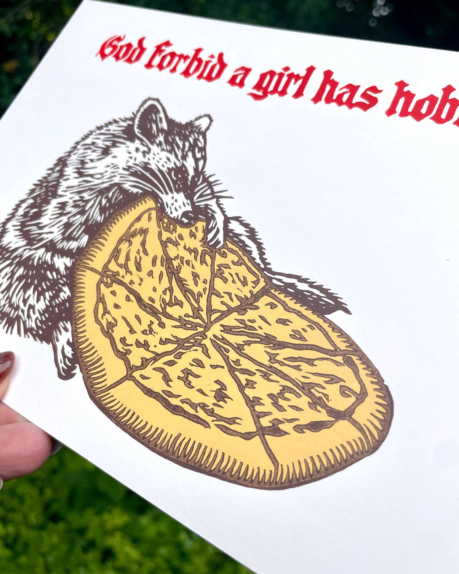 Illustration of a raccoon with a pizza and text on a white background
