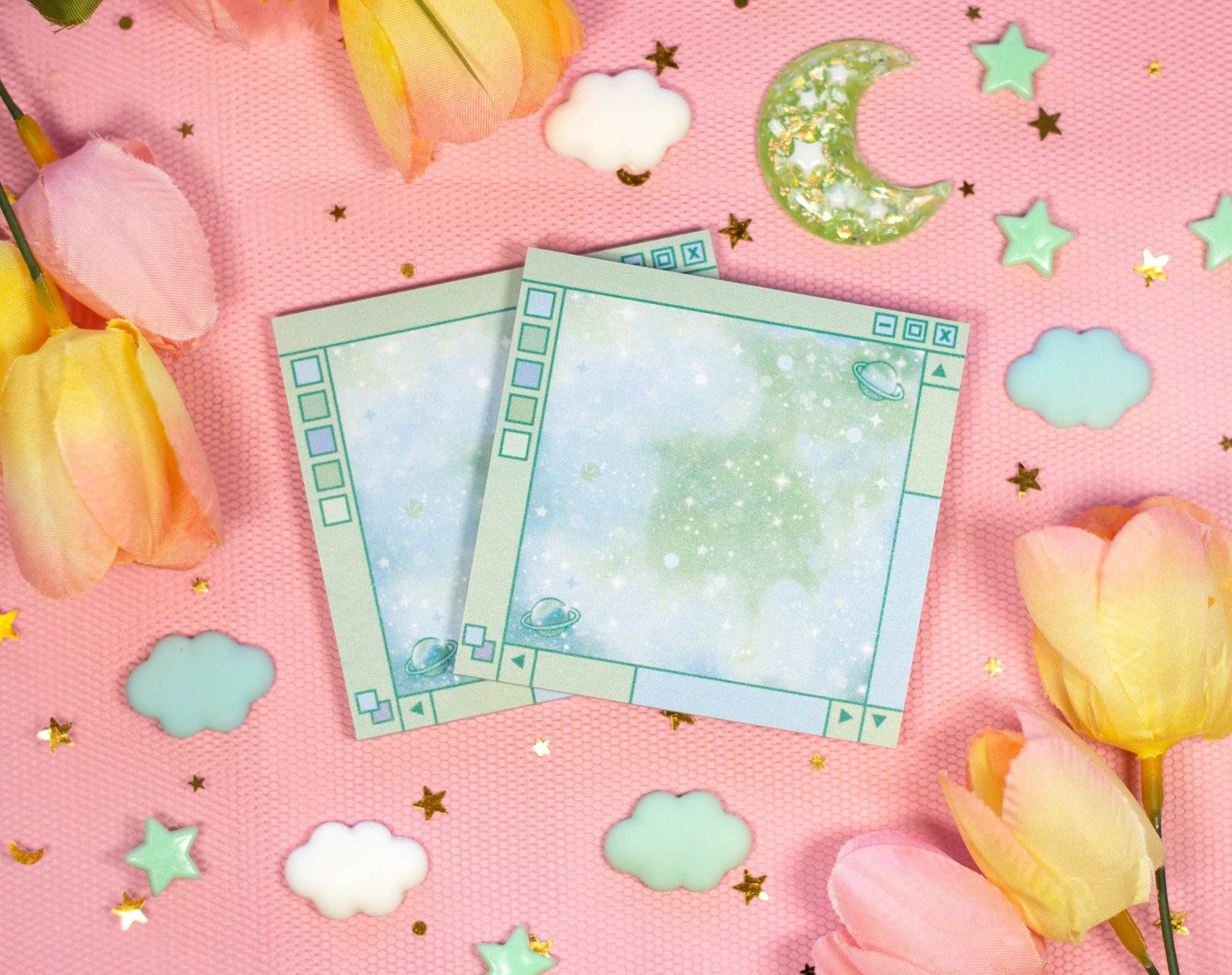 Two decorative sticky notes on a pink background with flowers and stars.