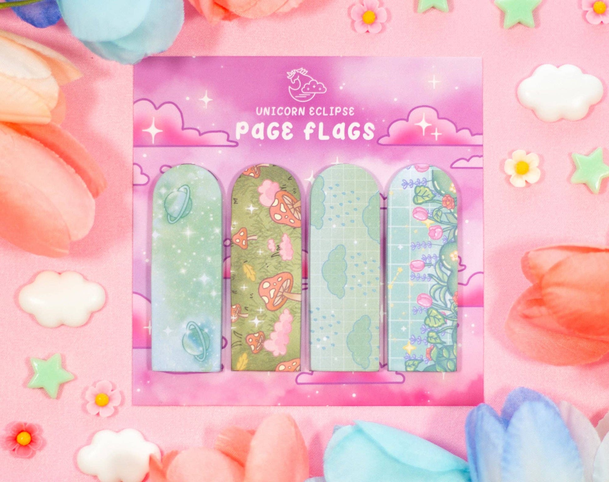 Set of colorful page flags with a pastel design on a pink background