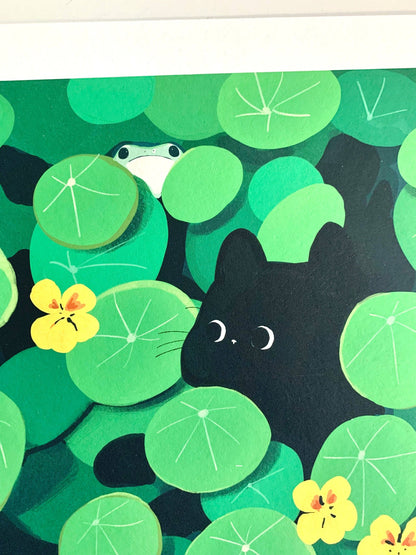 Illustration of a black cat, frog, and water lilies on a green background, Hide and Seek Cat Art Print
