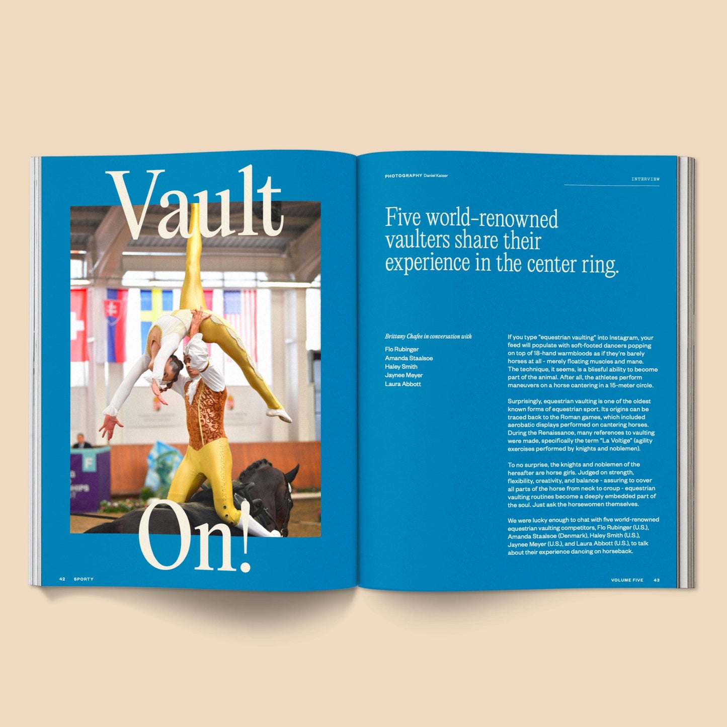 Open magazine with a gymnast on the cover and text about vaulters.