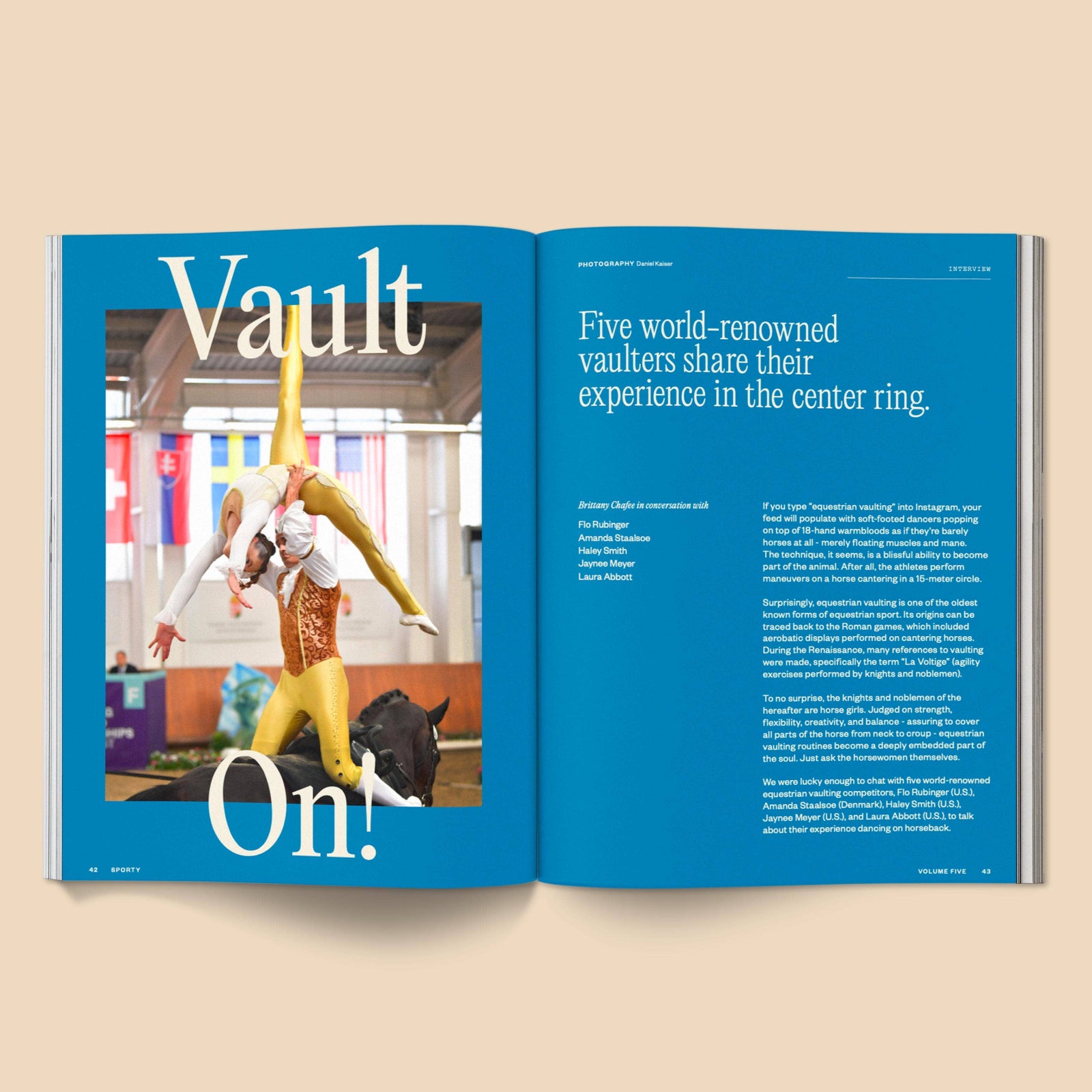Open magazine with a gymnast on the cover and text about vaulters.