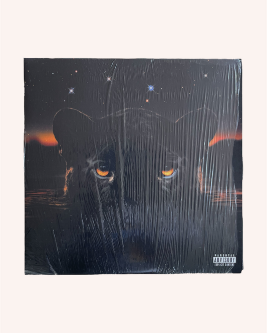 Vinyl record cover with a panther design and 'Parental Advisory' label. Jaguar II Deluxe Vinyl Record - Victoria Monet