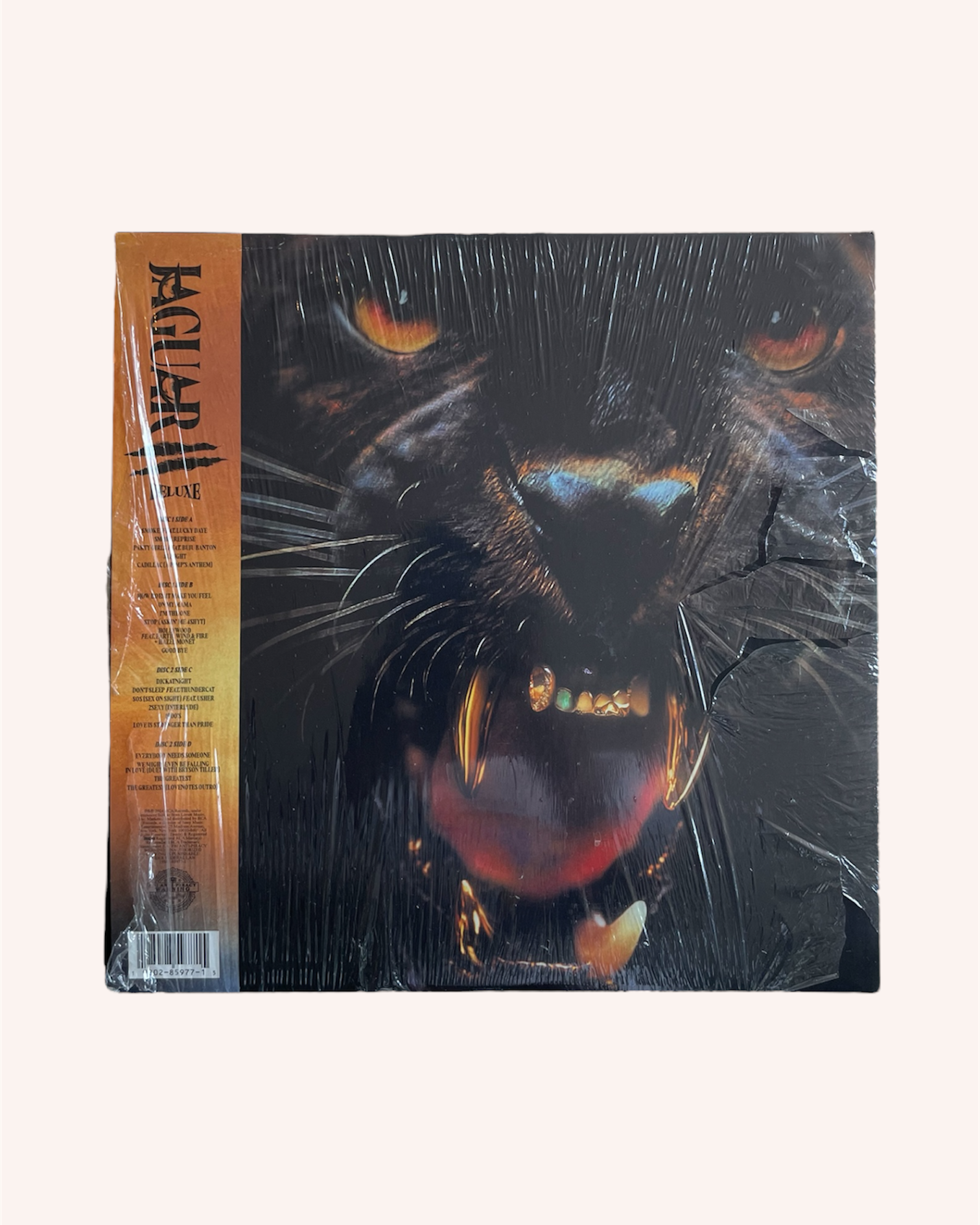 Vinyl record with a black panther design on the cover, Jaguar II Deluxe Vinyl Record - Victoria Monet