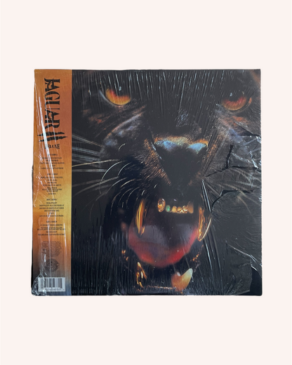 Vinyl record with a black panther design on the cover, Jaguar II Deluxe Vinyl Record - Victoria Monet