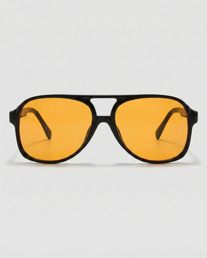 Sunglasses with yellow lenses and black frames on a white background