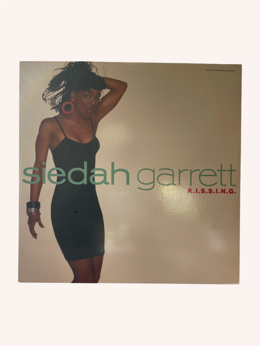 Album cover featuring a woman in a black dress with 'siedah garrett' text.