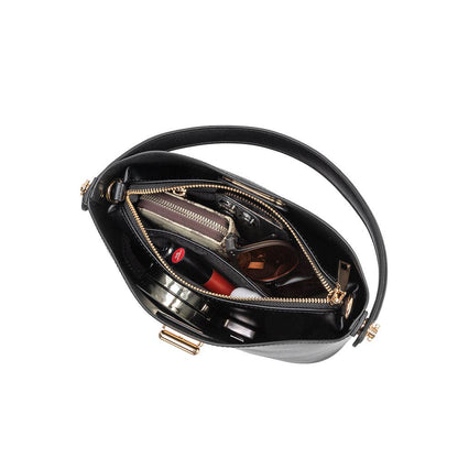 Black handbag with gold accents open on a white background, Lana Black Crossbody Bag Melie Bianco