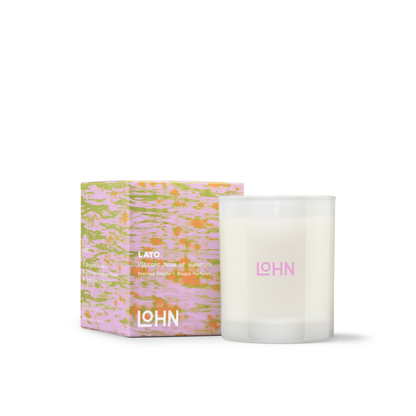 Candle with packaging featuring the brand 'LOHN' on a white background