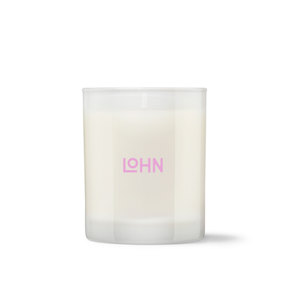 White candle with 'LOHN' logo on a white background