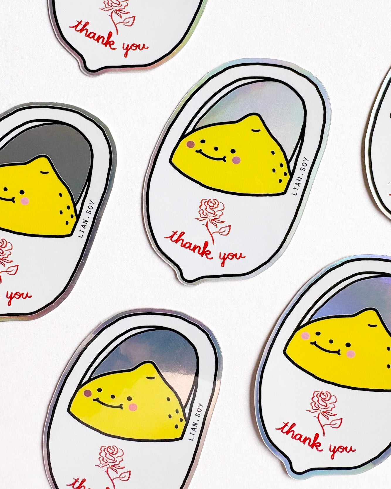 Stickers with a lemon character and 'thank you' text on a white background