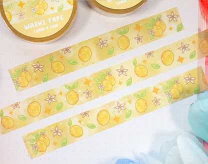 Decorative washi tape with lemon designs on a light surface