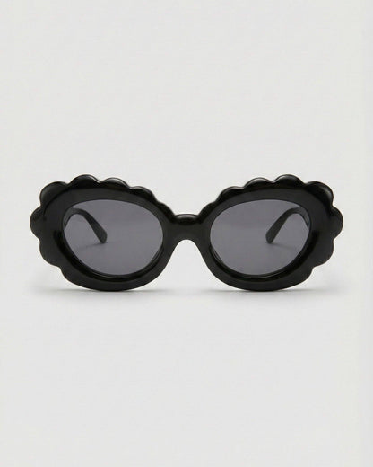 Black sunglasses with a unique frame design on a white background