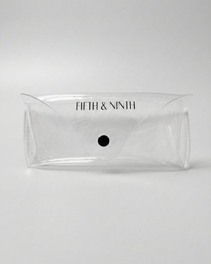 Clear pouch with 'Fifth & Ninth' branding on a white background