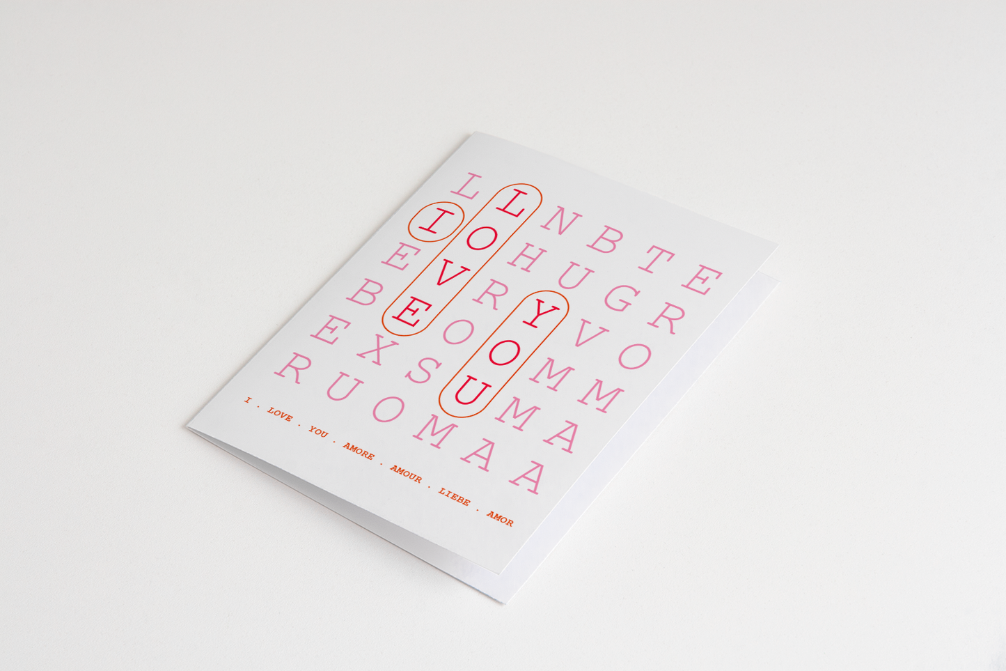 White book with red text on a light gray background
