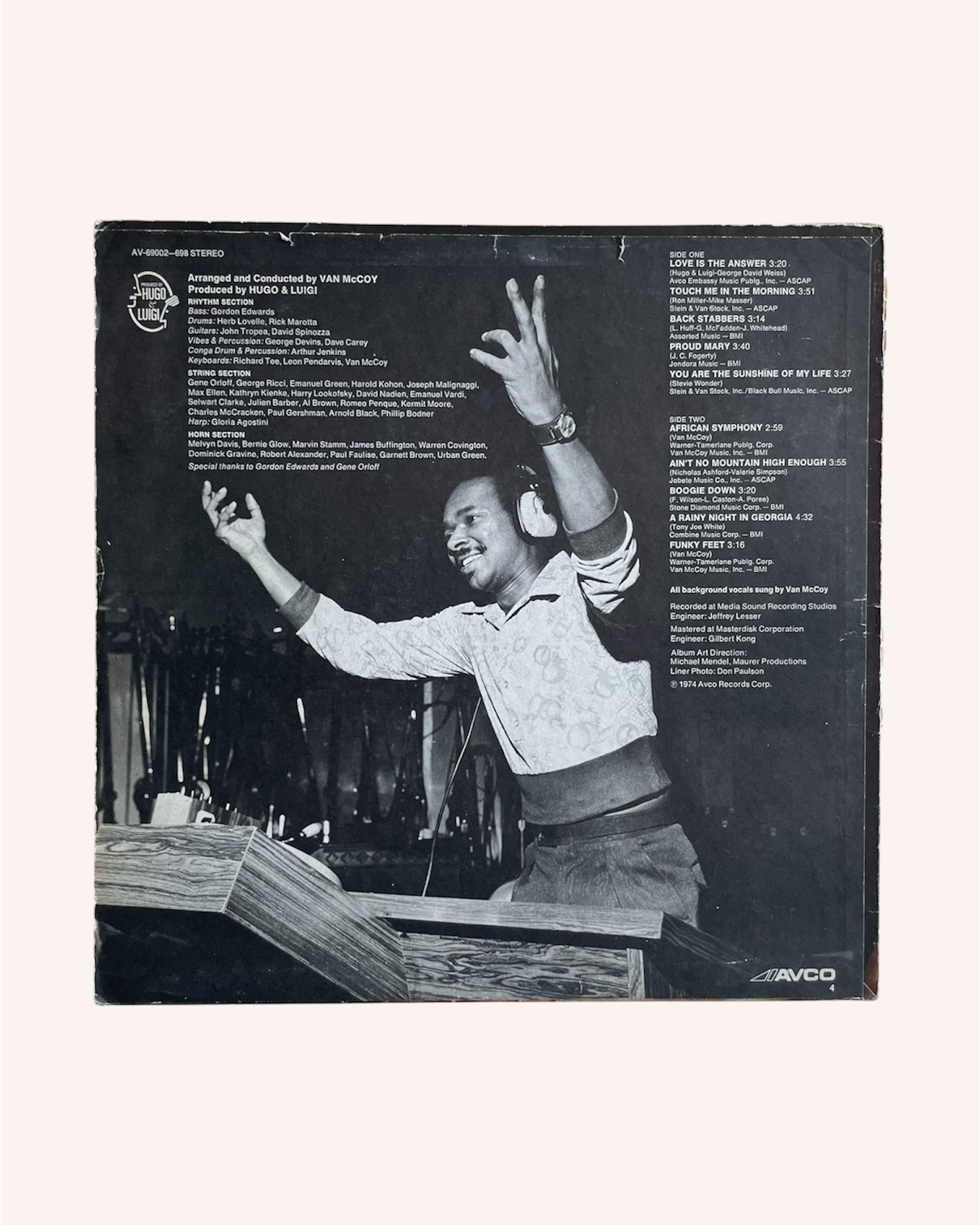 Vinyl record sleeve with a black and white photo of a person on a stage, text, and a visible brand logo. Love is the Answer Vinyl Record - Van McCoy and the Soul City Symphony
