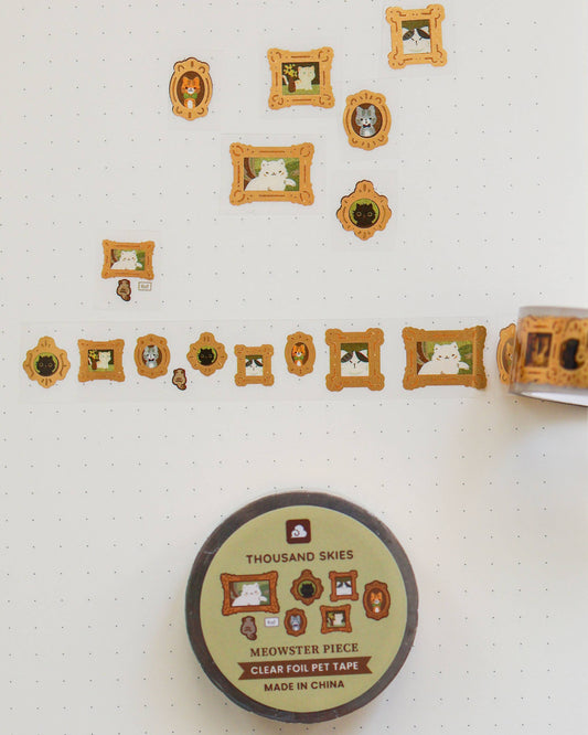 Decorative tape with picture frame designs on a white surface