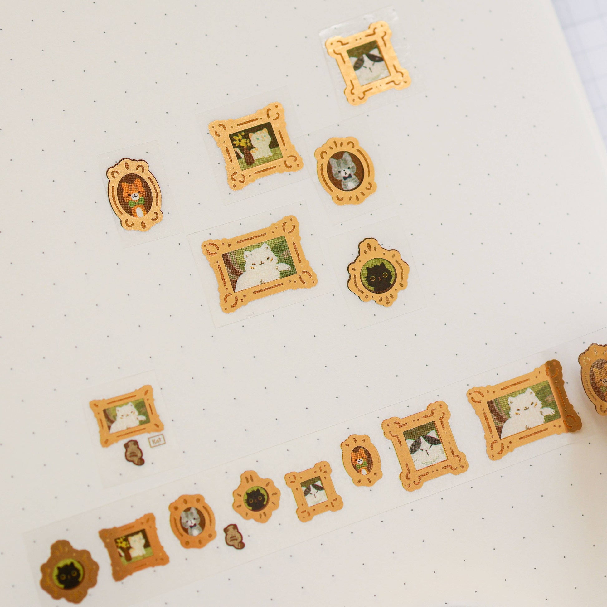 Decorative stickers with animal illustrations in picture frame designs on a white background.