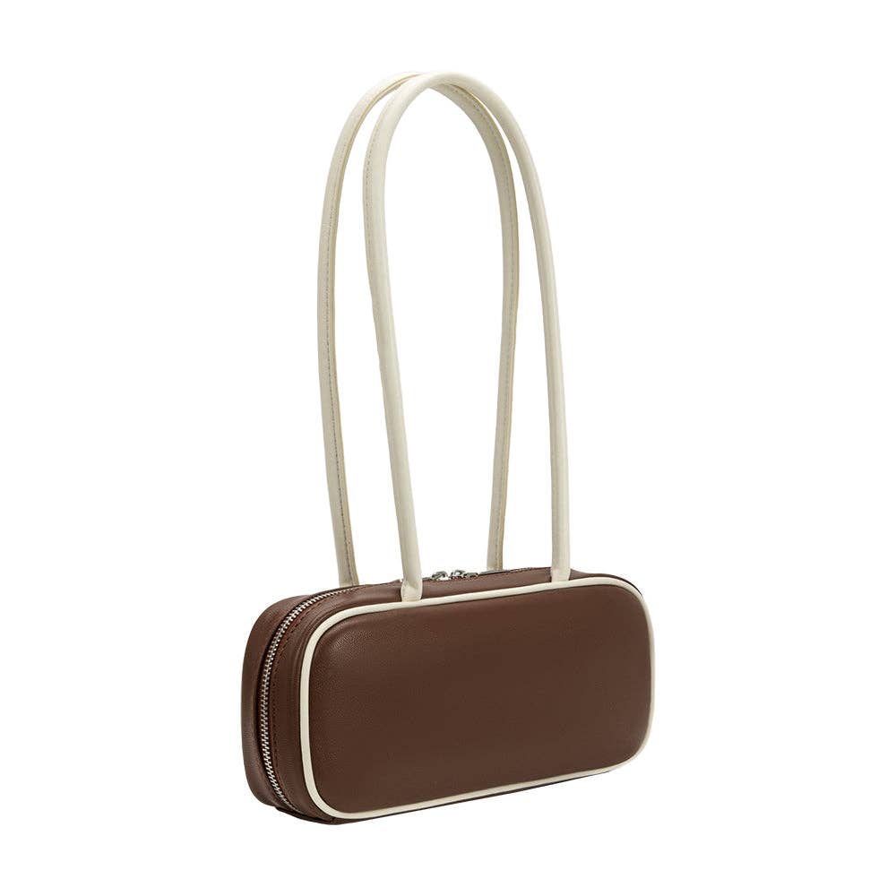 Brown handbag with a white strap on a white background