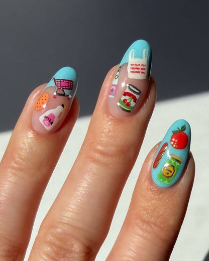 Nails with colorful designs on a neutral background