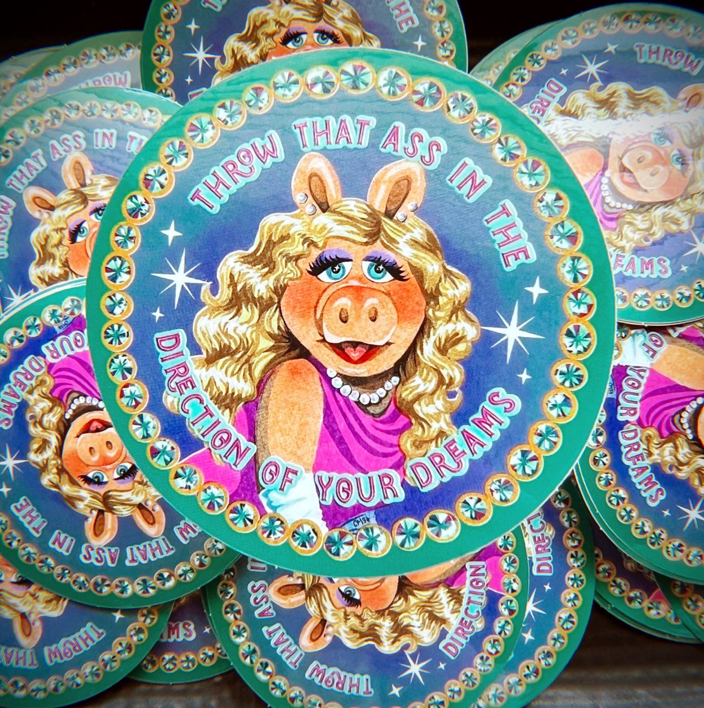 Decorative plates featuring a stylized pig character with text on a colorful background.