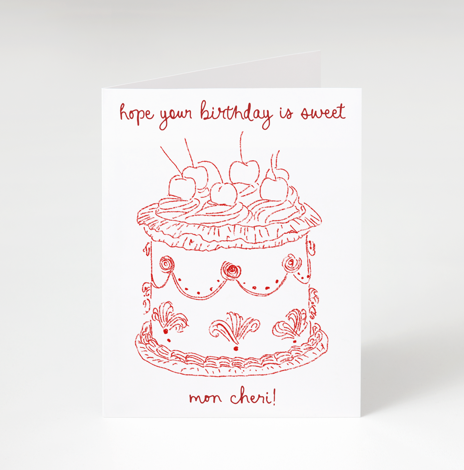 Greeting card with red cake illustration and text on a white background
