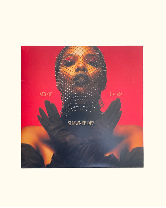 Vinyl cover with a person wearing a textured headpiece and black gloves on a red background, Moody Umbra Vinyl Record - Moody Umbra