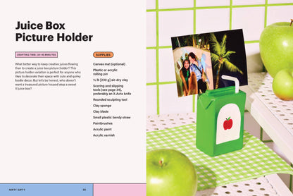 Juice box picture holder with a photo of a couple on a green checkered tablecloth.