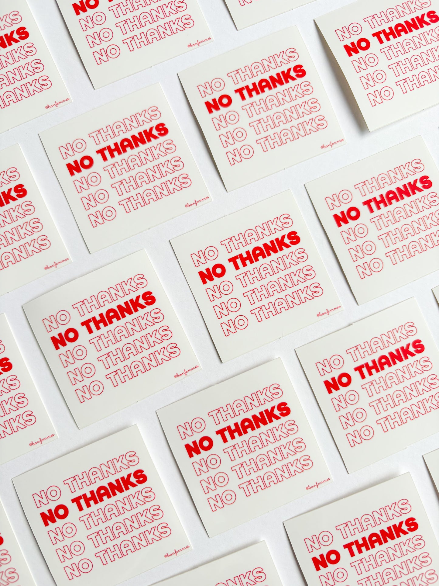 Multiple stickerswith 'No Thanks' text printed on them.