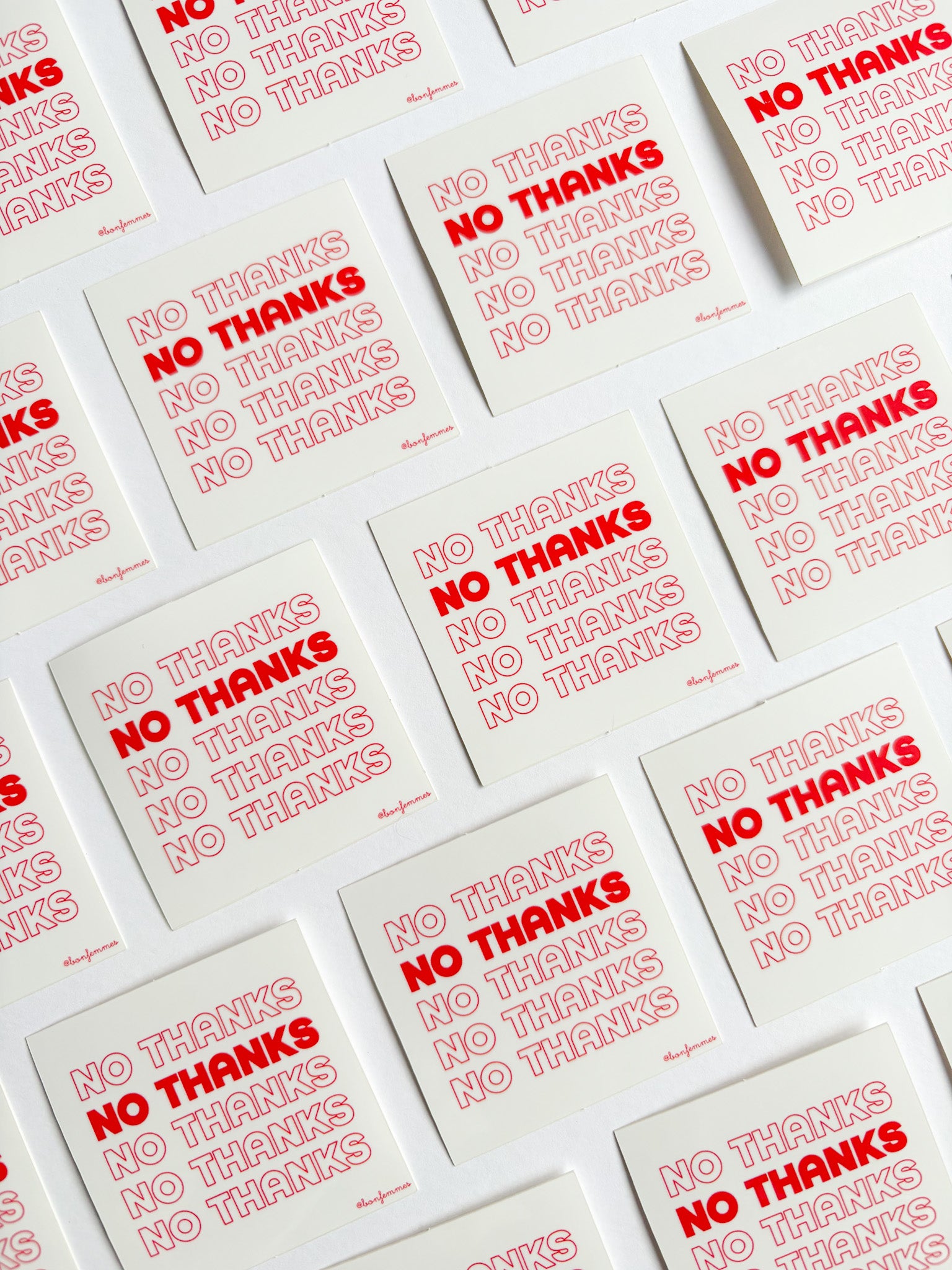 Multiple stickerswith 'No Thanks' text printed on them.