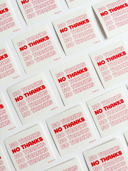 Multiple stickerswith 'No Thanks' text printed on them.