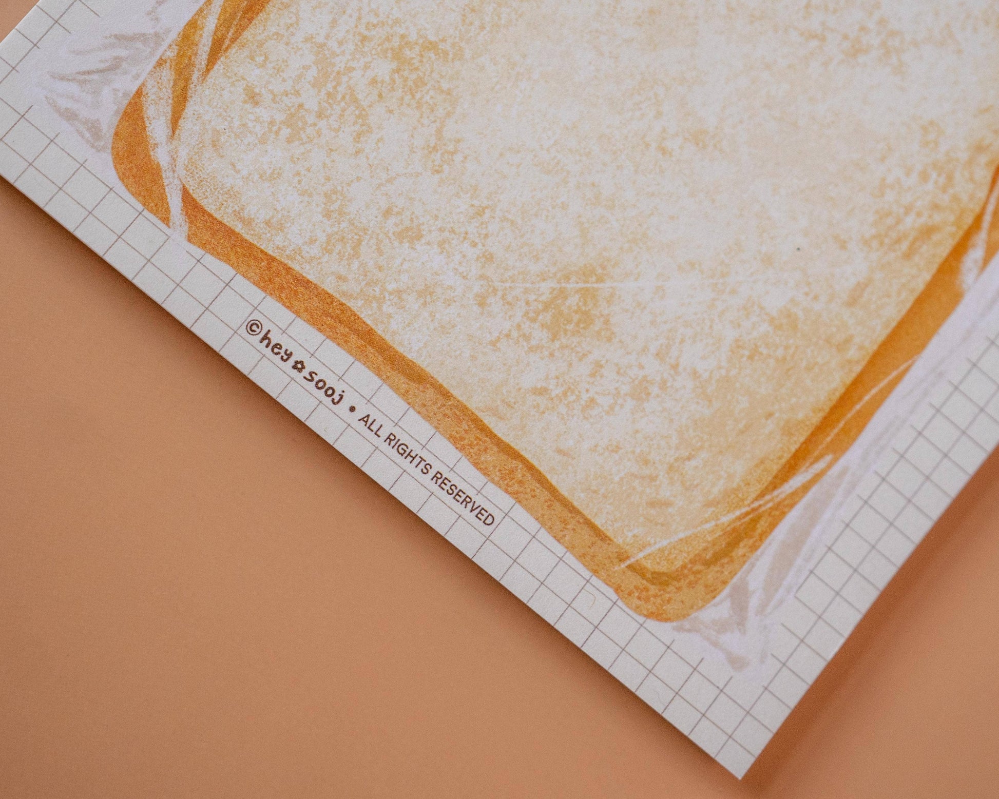 Printed paper with bread design on a grid background