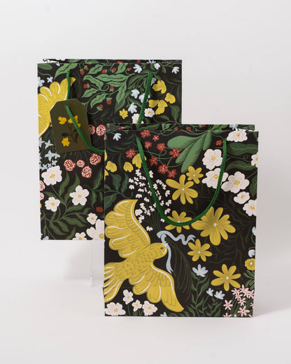 Floral-patterned bags with a bird design on a white background, Of A Feather Medium Paper Gift Bag