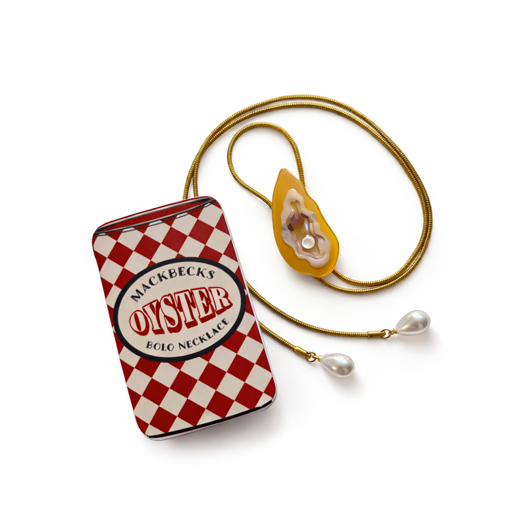 Mackeecks Oyster necklace packaging with a gold chain and oyster pendant on a white background