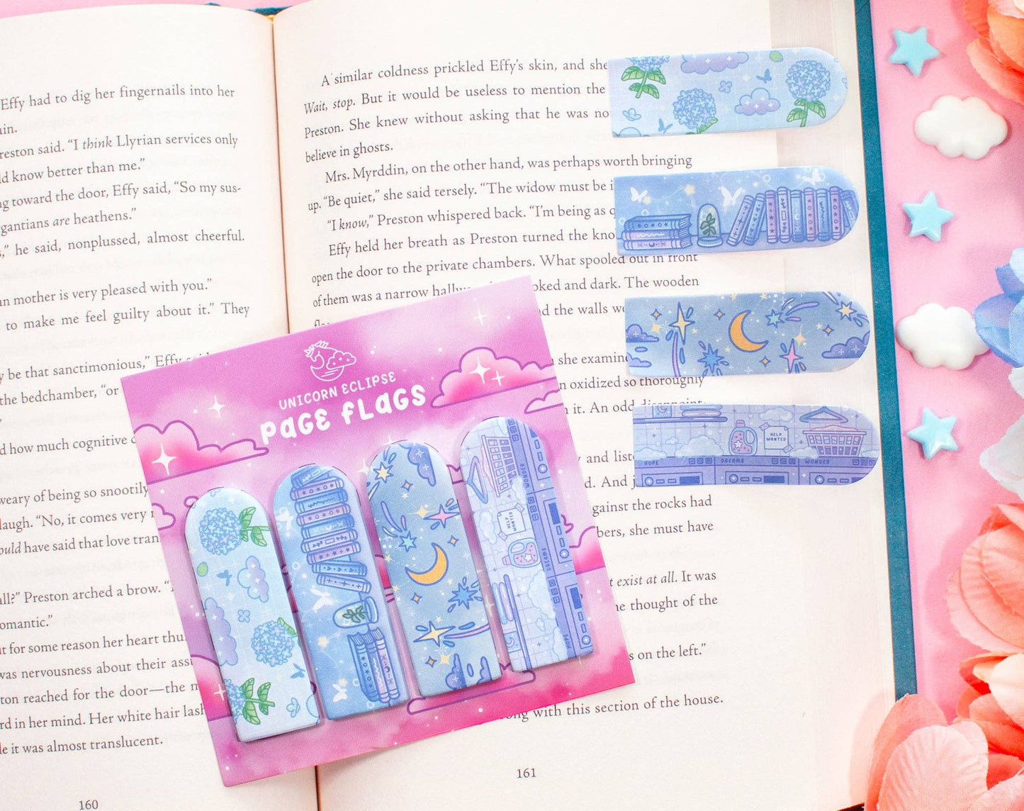 Pack of page flags on a book with decorative elements.