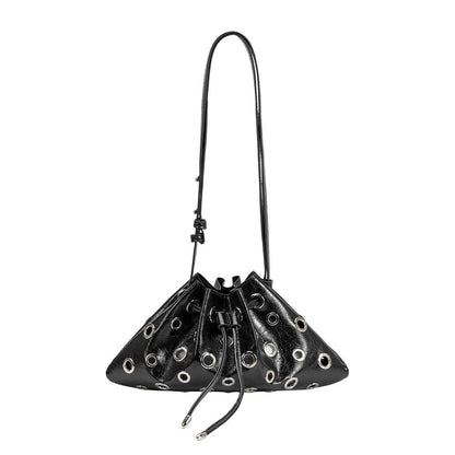A black faux-leather bucket bag with a drawstring closure and multiple silver-tone metal grommets, shown against a plain white background.