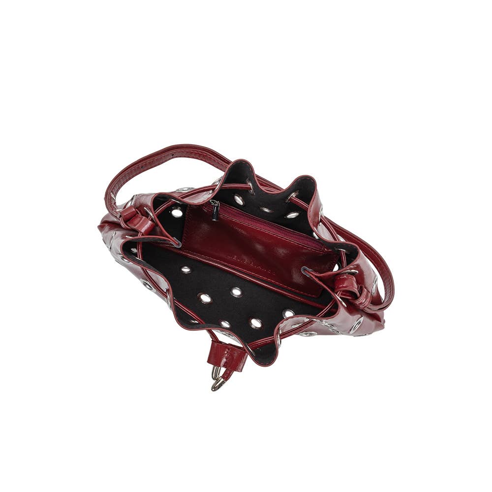 Red handbag with a unique design on a white background