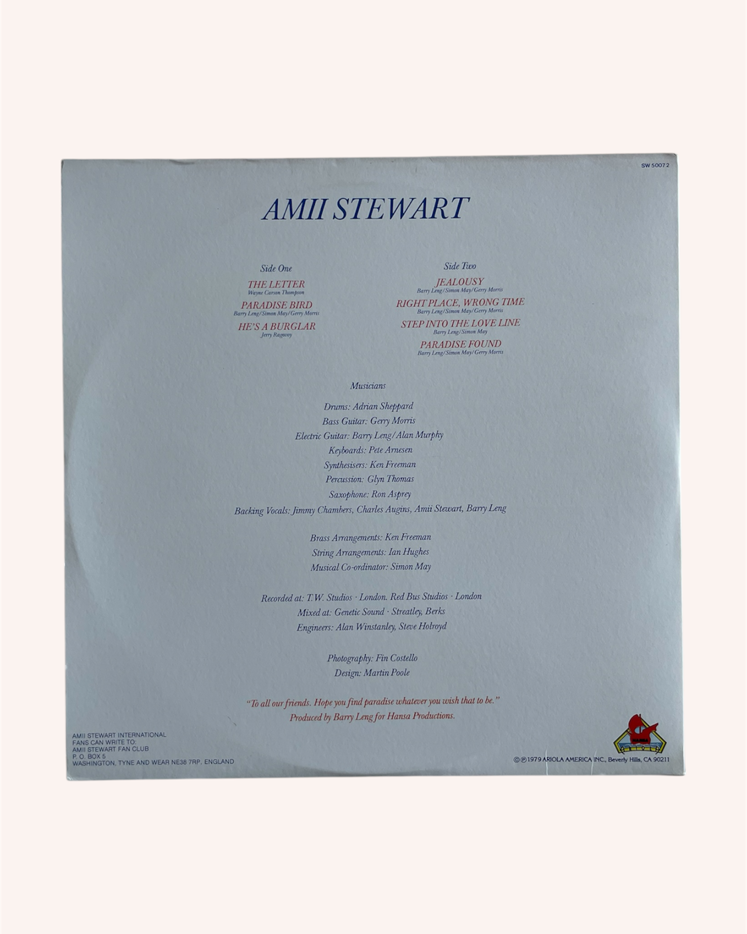 Back cover of a music album with text and a logo on a light gray background, Paradise_Bird_Vinyl_Record_-_Amii_Stewart