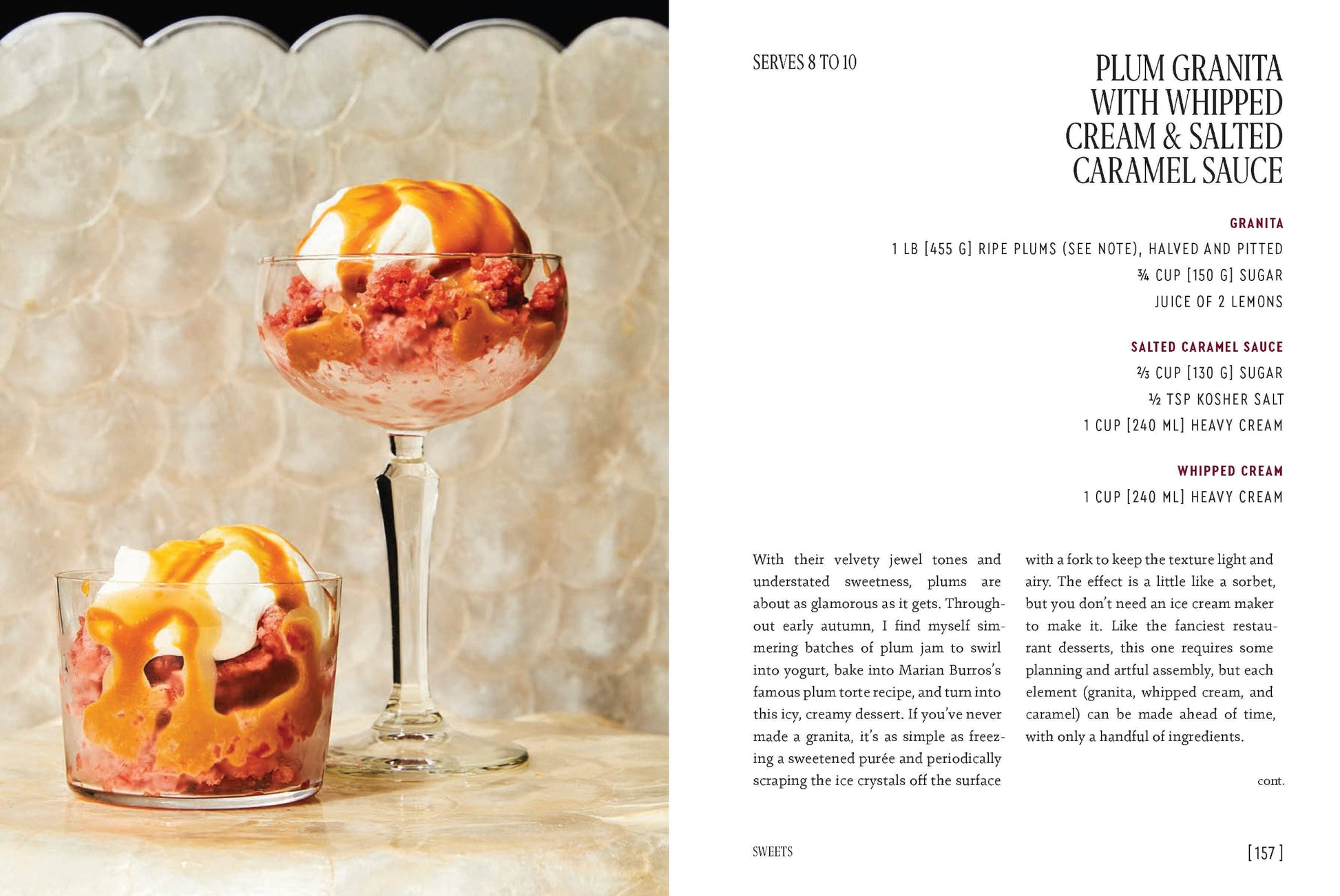 Two glasses of plum granita with whipped cream and salted caramel sauce on a textured surface.