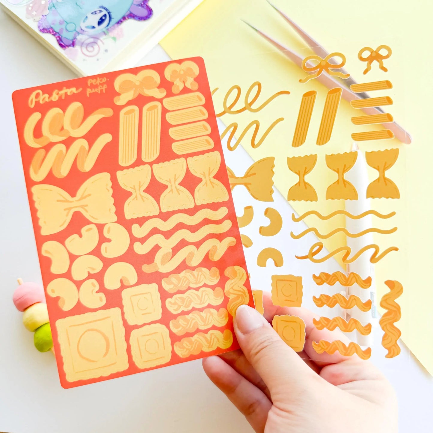 Pasta-themed decorative stickers on a white background