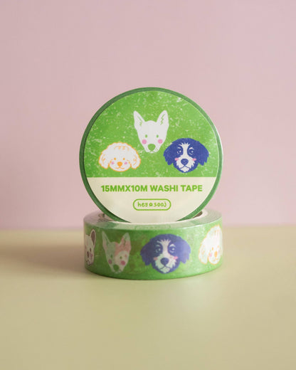 Green washi tape with animal designs on a pink background